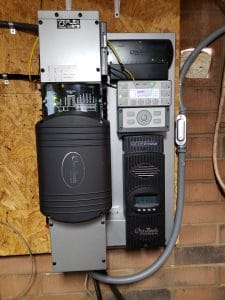 Off-grid Outback FP1 inverter, FM80 charge controller, and Mate3s control panel