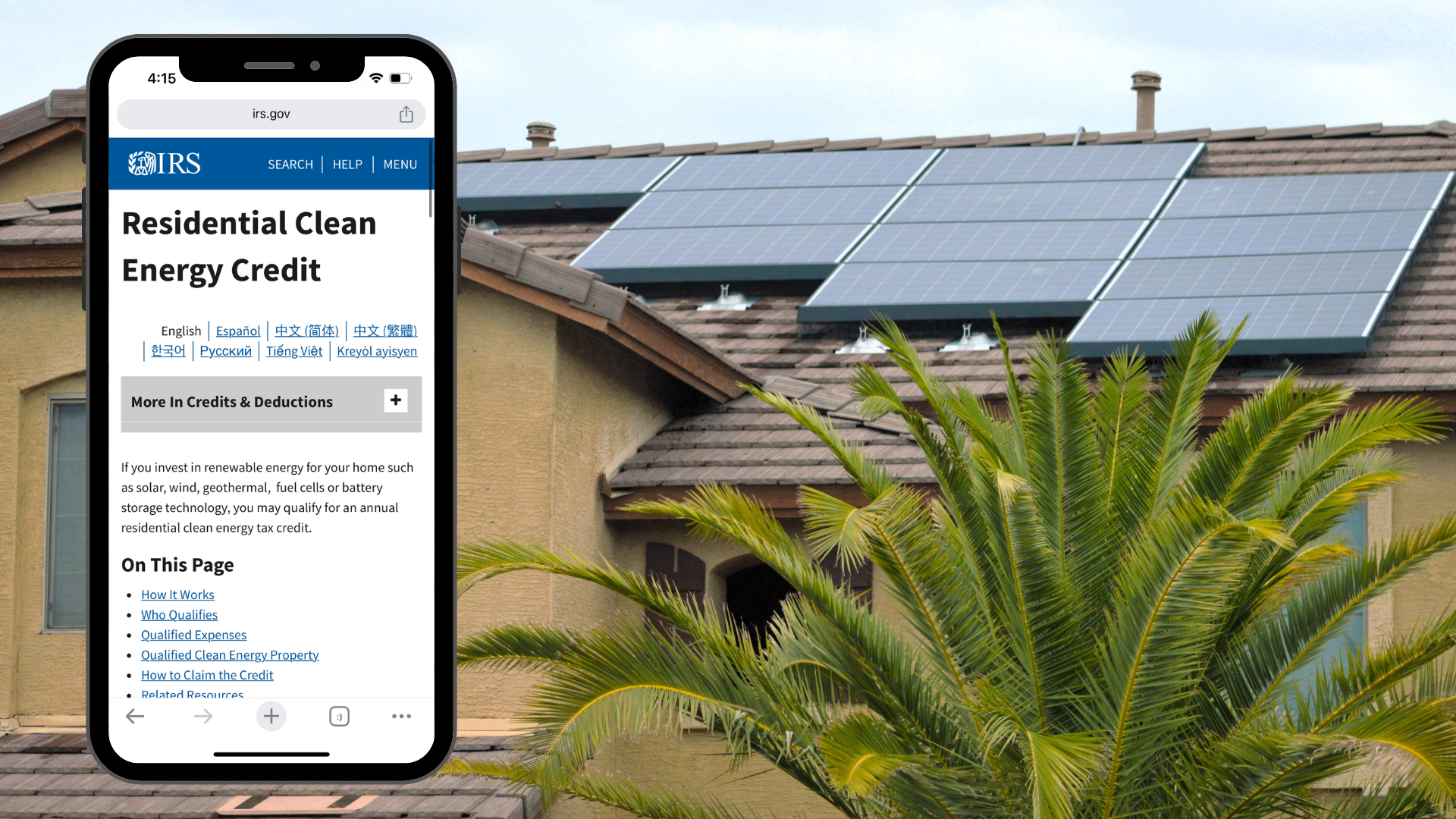 Phone with Residential Clean Energy Credit information from the IRS on it in front of home with rooftop solar